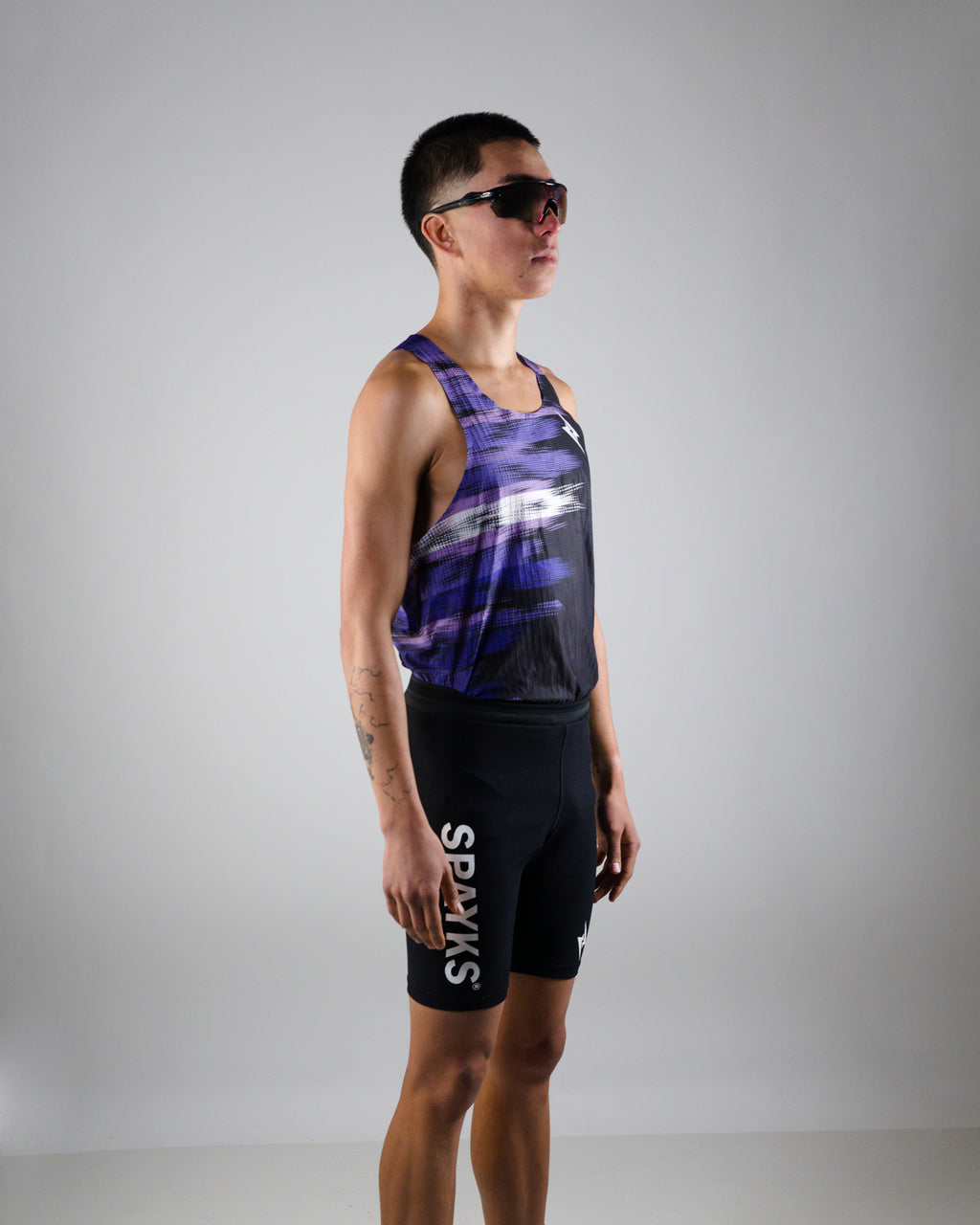 POLERA RUNNING ELITE MORADA