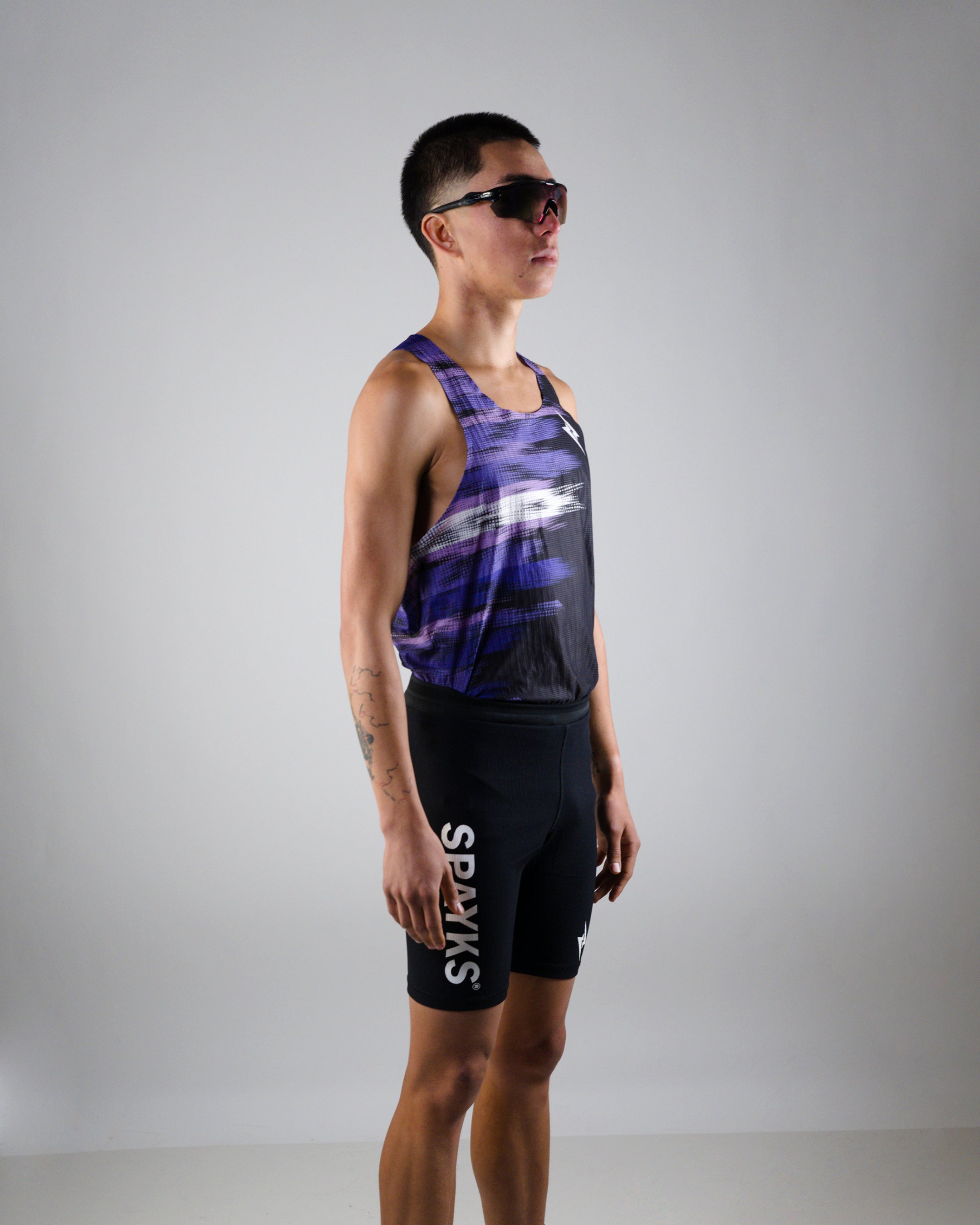 POLERA RUNNING ELITE MORADA